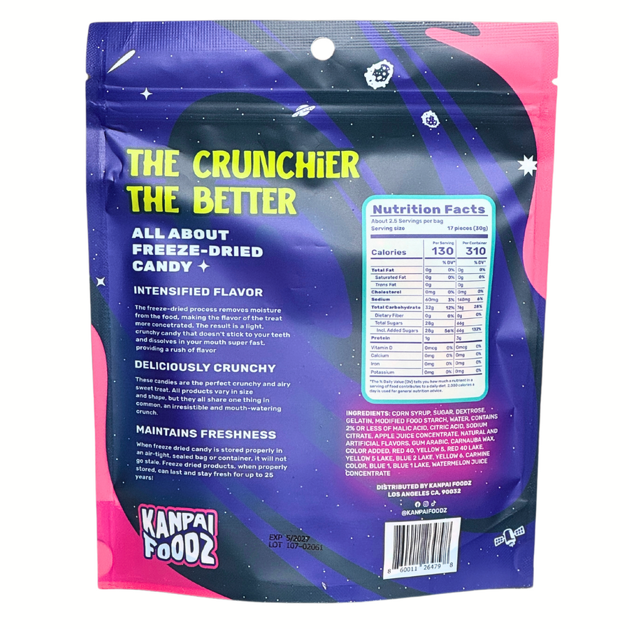 Back of the bag of freeze-dried gummy clusters candy called 'Cosmic Crunch' made by Kanpai Foodz. The packaging features the text 'The Crunchier The Better' and details about the product, including intensified flavor, deliciously crunchy texture, and freshness maintenance. There is also a nutrition facts label and a list of ingredients on the right side.